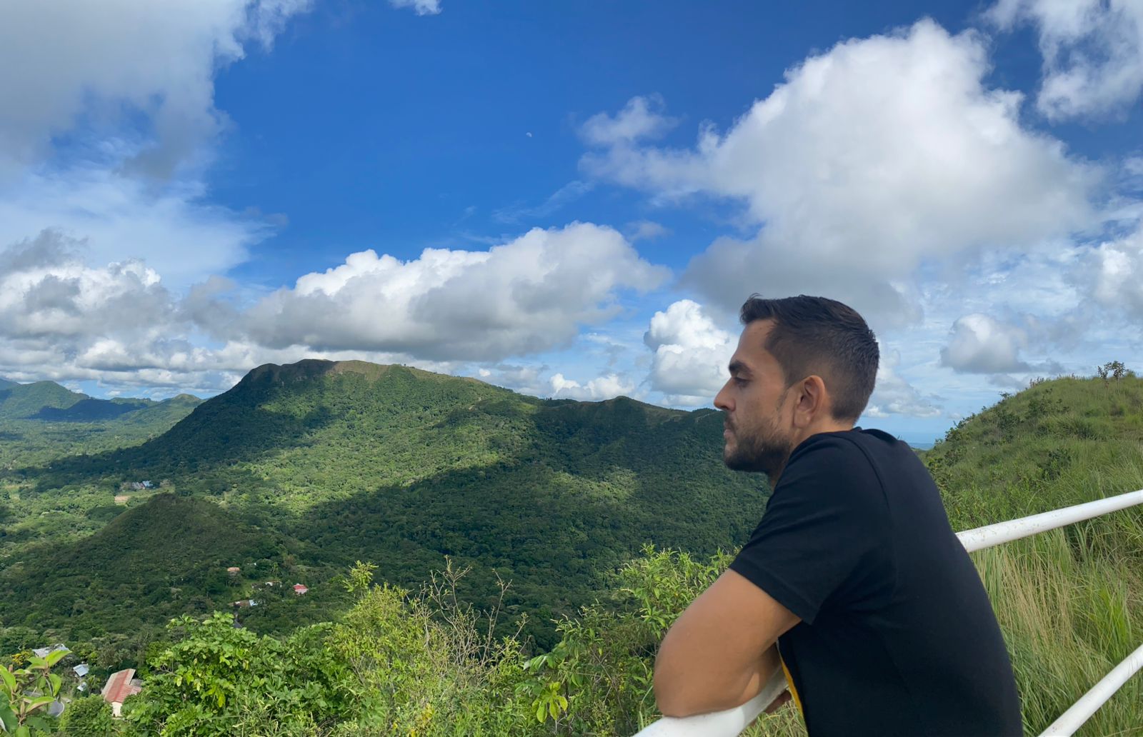Sean Ali with a wide mountain view