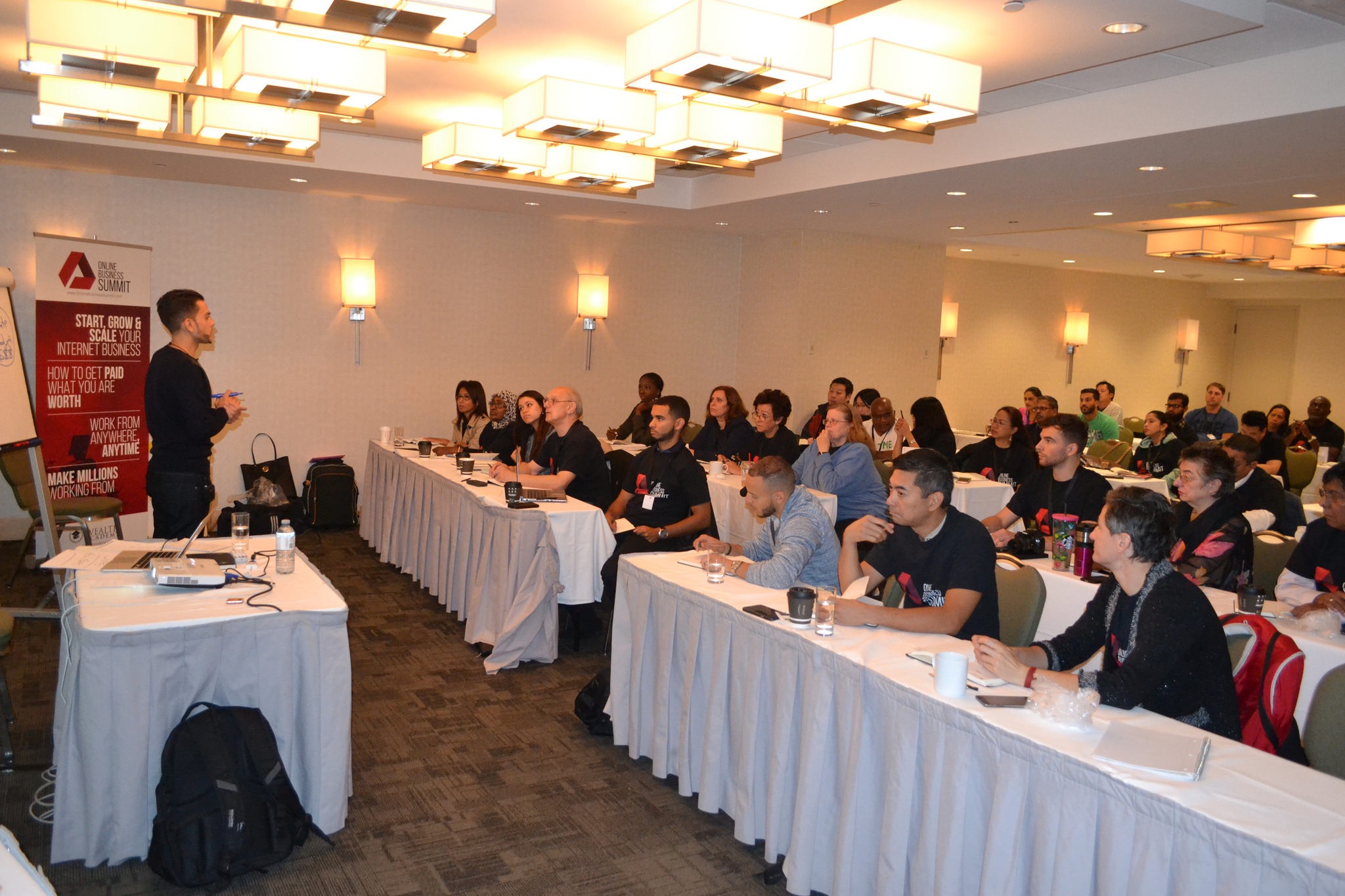 Sean Ali teaching a workshop about business and systems