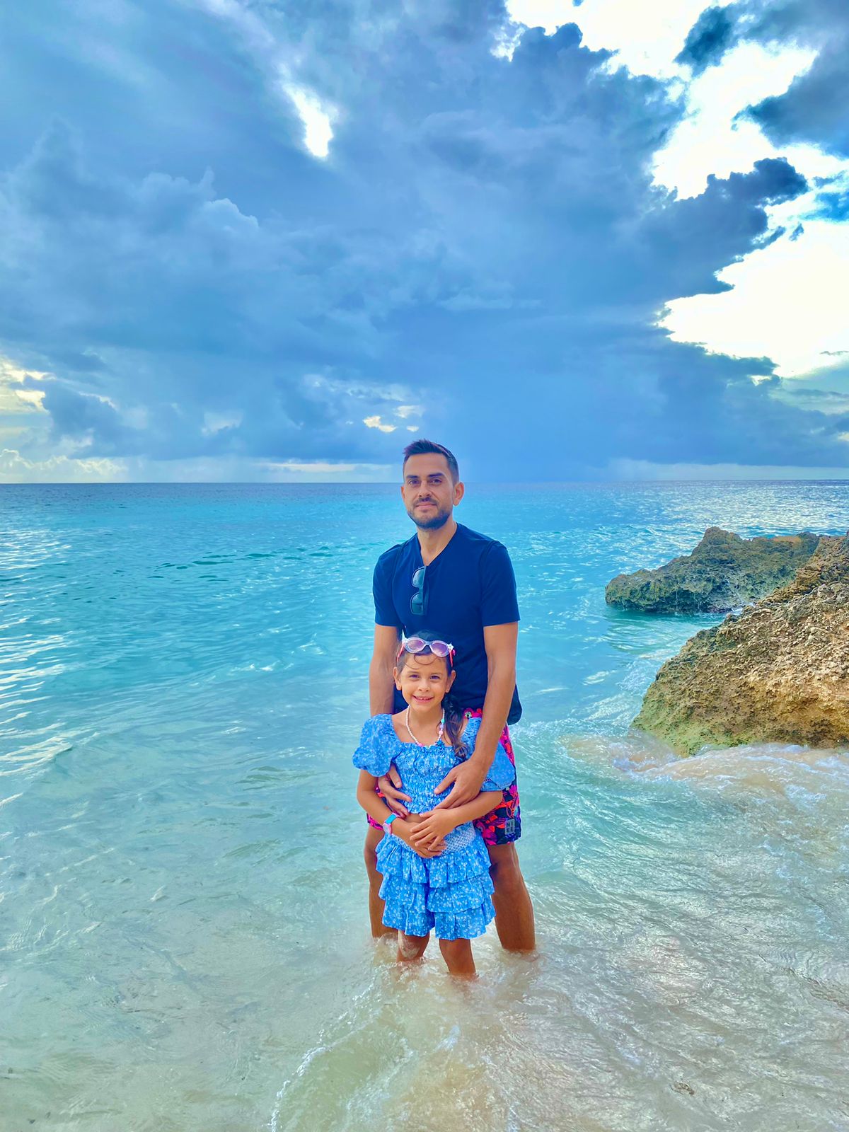 Sean Ali on a tropical beach during a freedom and manifestation season